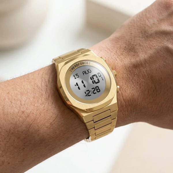 Wrist worn - Gold digital wristwatch with metallic band, three side buttons, and display