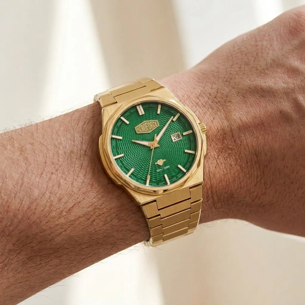 Wrist worn of Gold-tone stainless steel watch with green textured dial, date display, and integrated bracelet