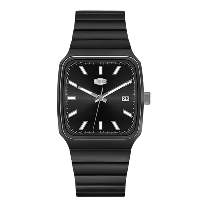 A modern square analog watch with a matte black case, black dial, and a ribbed black silicone strap, shown against a plain white background.