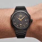 A luxurious Heroforce 5006 sunburst watch worn on a person's writst in the daylight