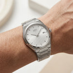 HeroForce 5012 - Luxury M - worn wrist, minimalist studio, natural daylight